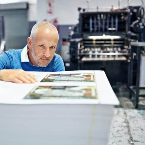 Printer inspecting press sheets