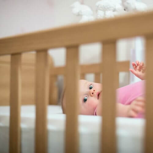 Baby in a comfy crib