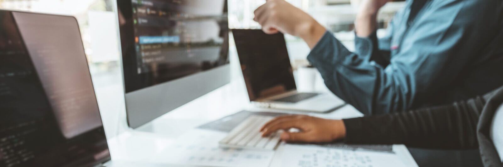 Computer programmers compiling code