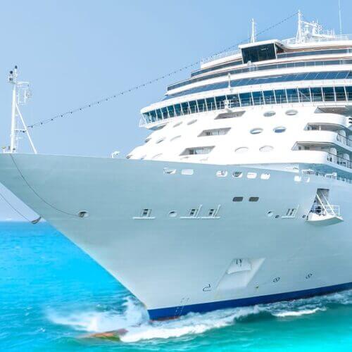 Cruise ship sailing over turquoise blue waters