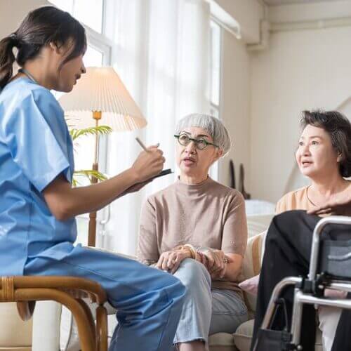 Nurse working with a group of senior folks
