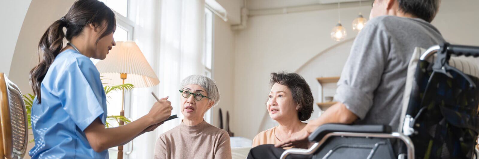 Nurse working with a group of senior folks