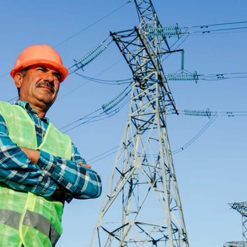 Engineer inspects power lines